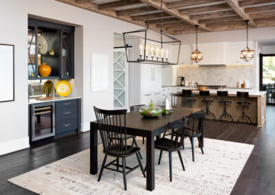 rustic modern dining room with dark table and floor